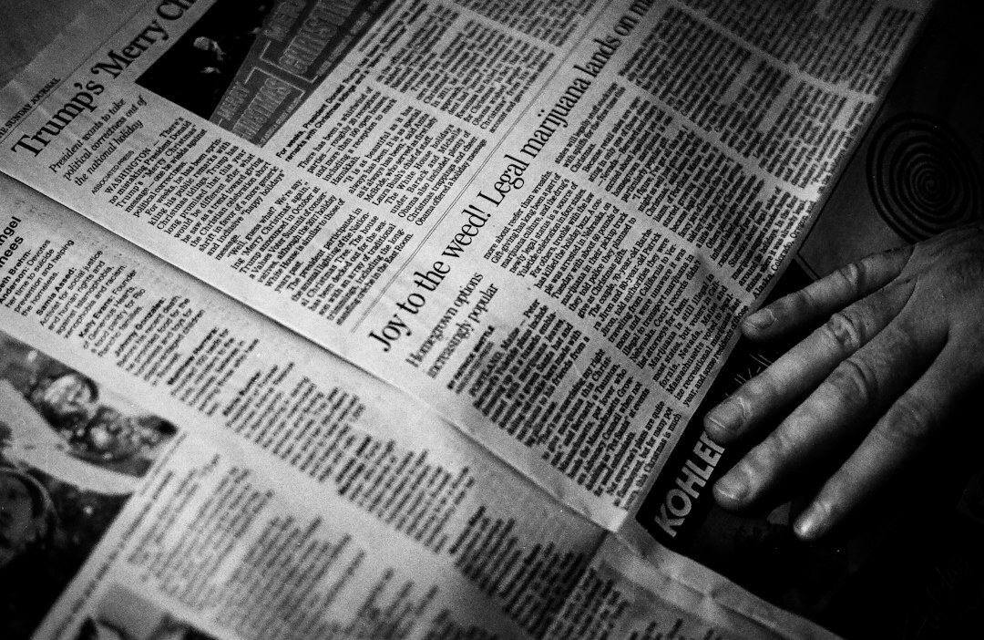 person reading newspaper quietly