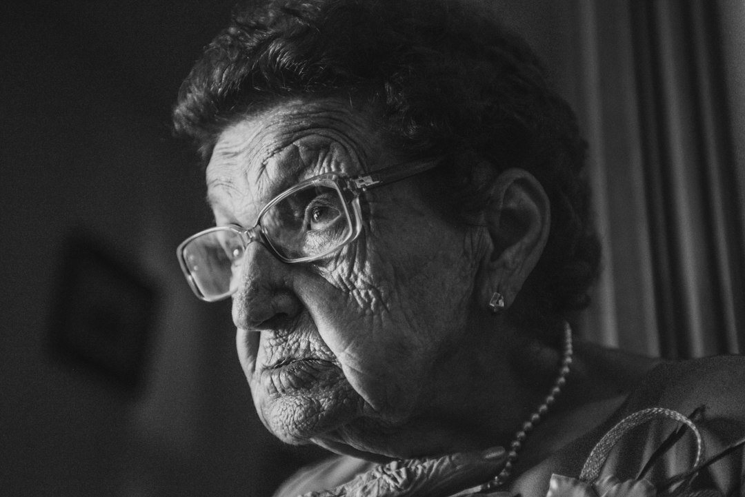 Portrait of an older German woman sociologist with glasses